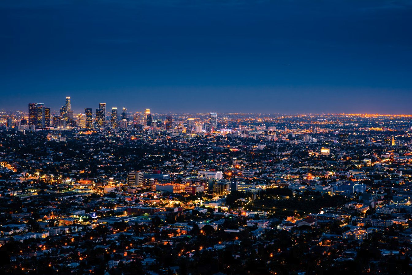 A city skyline in golden evening light